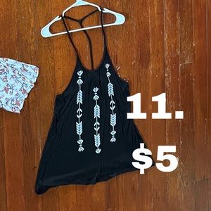 white arrows on black tank